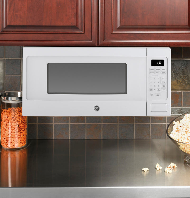 GE - Profile Series 1.1 Cu. Ft. Mid-Size Microwave - White on white_3